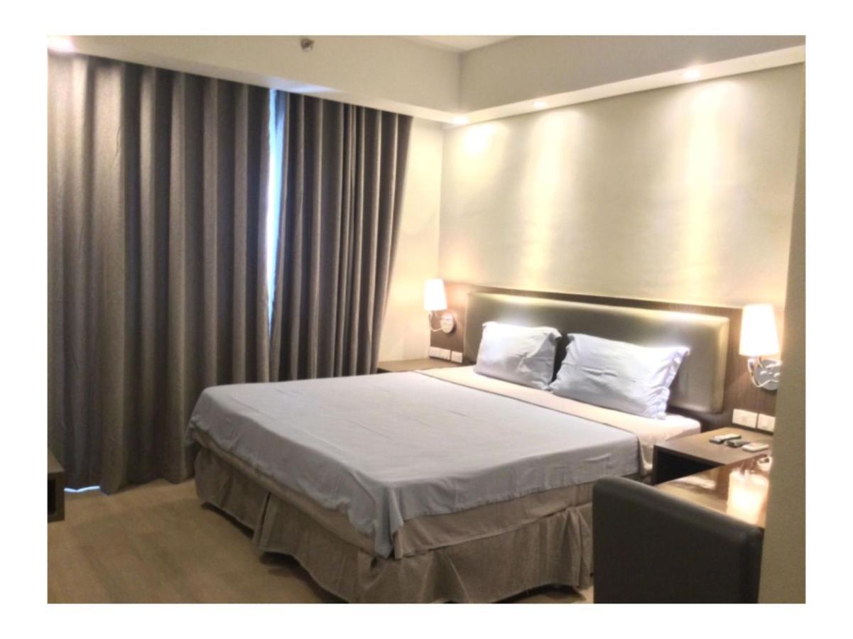 Capital O 804 The Residences At Bonifacio Civic Center Manille Extérieur photo