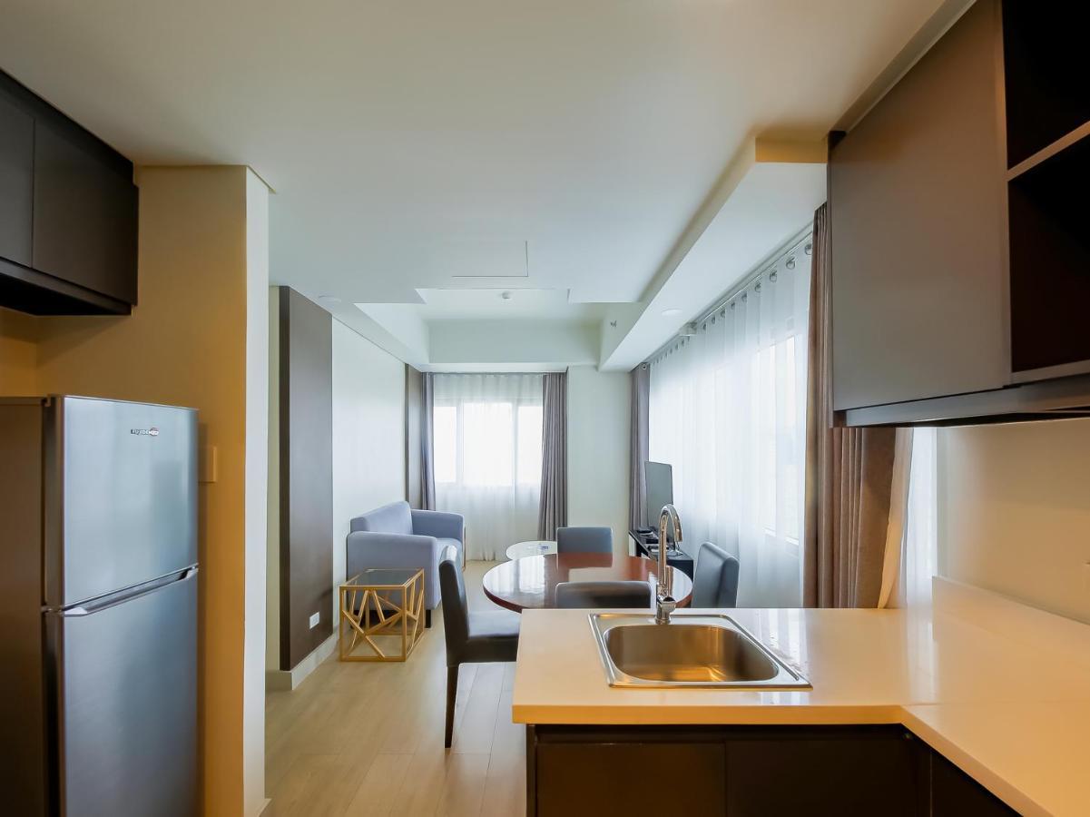 Capital O 804 The Residences At Bonifacio Civic Center Manille Extérieur photo