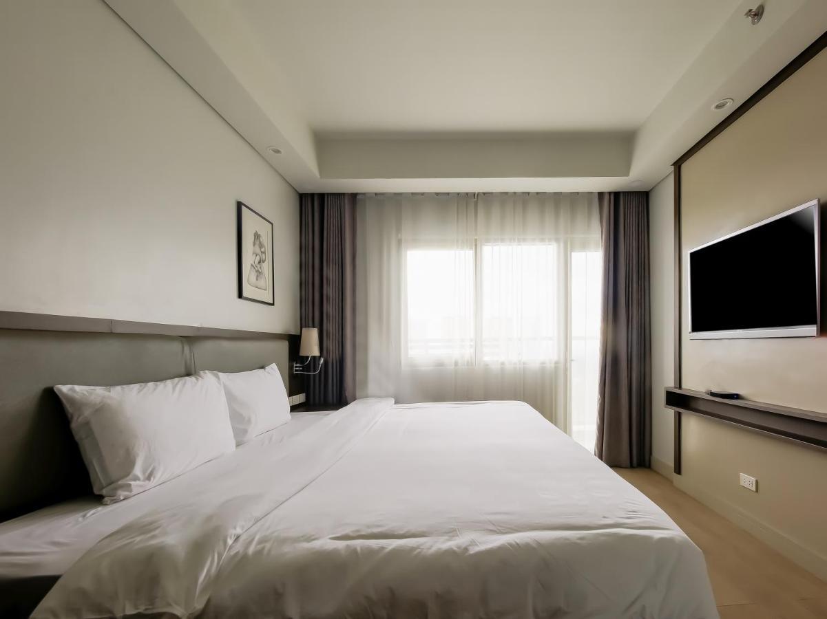 Capital O 804 The Residences At Bonifacio Civic Center Manille Extérieur photo