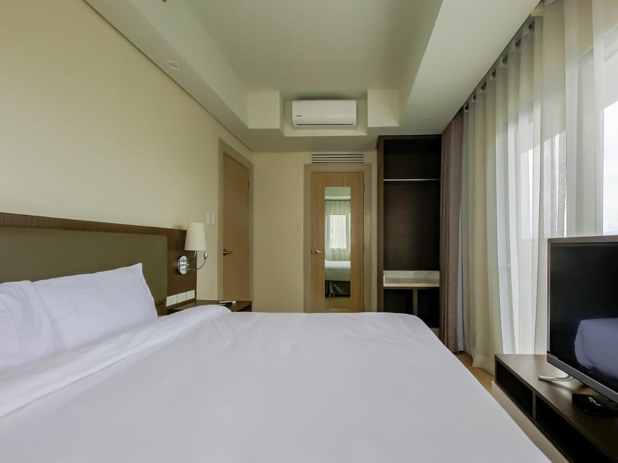 Capital O 804 The Residences At Bonifacio Civic Center Manille Extérieur photo