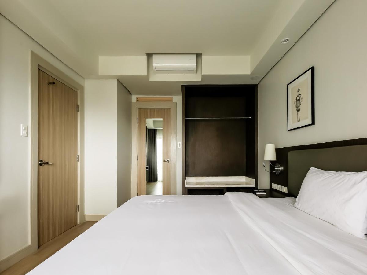 Capital O 804 The Residences At Bonifacio Civic Center Manille Extérieur photo